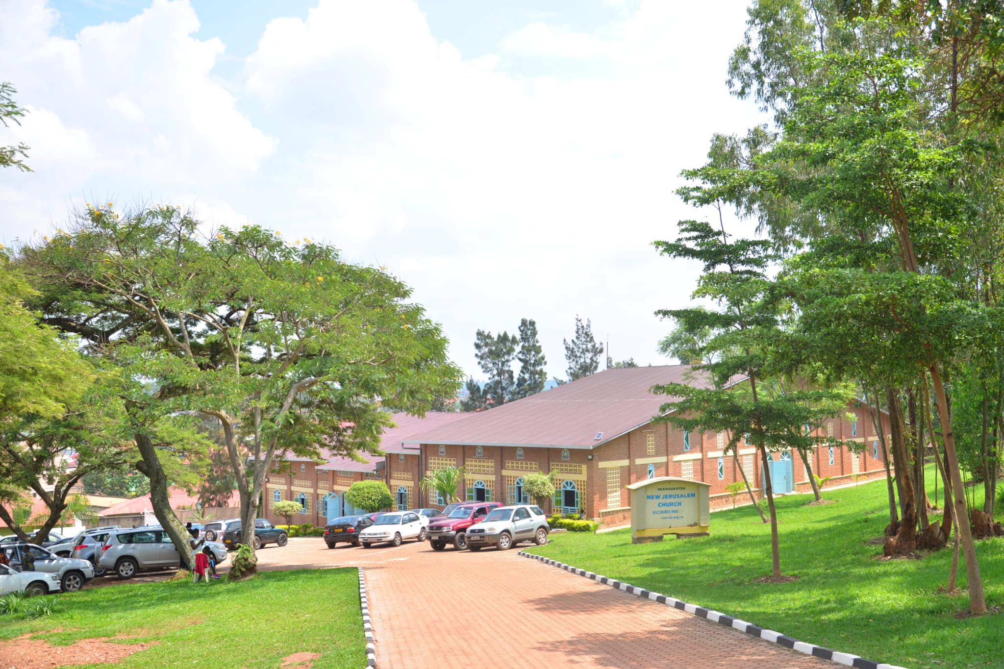 Worship service with people raising their hands in praise